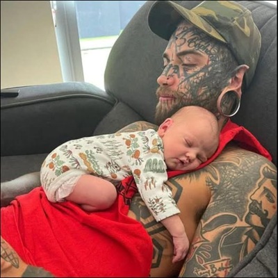 A 24-year-old dad covered in over 200 tattoos removed them all for his baby girl — his transformation will leave you speechless.  Advertisement: 0:35  A detailed report on Ethan “ModBoy” Bramble’s transformation and the reasons behind it  Ethan “ModBoy” Bramble, widely recognized in Australia for his extreme body modifications and distinctive tattoos covering nearly his entire body.  Has begun a long and painful process to remove many of his tattoos — particularly those on his face — in an effort to create a more approachable image for the sake of his young daughter.  His decision, reported by multiple international news outlets, has sparked global conversation about identity, parenting, and the societal perceptions surrounding heavily tattooed individuals.  According to Newsner, ABC News Australia, Wprost, Medium, and other reputable sources, Bramble’s process of tattoo removal marks a major shift from the persona that once brought him notoriety.  His transformation reflects not only a physical change but also a deep emotional and psychological reevaluation of how he wants to be seen by his daughter as she grows up.    Early Modifications: A Life Shaped by Extreme Body Art Ethan Bramble began modifying his body at an unusually young age. As reported by Newsner, he started at just 11 years old, when he stretched his earlobes for the first time.  From there, he increasingly embraced modifications that many would consider extreme.  Over the next decade, Bramble underwent more than 40 different body modification procedures, including:  stretching his ears, splitting his tongue, removing his belly button, tattooing his entire face, covering large portions of his arms, chest, and legs in ink.  He explained in interviews that the modifications once served as a form of self-expression, independence, and personal control. For years, he embraced being different and enjoyed the attention — positive or negative — that his appearance attracted.  But over time, the shock factor that once felt empowering began to feel isolating.  Media Attention and Public Perception Bramble’s appearance has been widely covered by media outlets worldwide. A story published by   Wprost described him as “one of the most modified young adults in the world” and noted the global attention he received due to his experimental look. While some admired his boldness, many reacted with shock, confusion, or judgment.  His public image became polarized — some viewed him as an artist, while others saw him as a symbol of excess or rebellion.    As his appearance grew more extreme, so did the reactions: strangers stared or whispered in public, parents pulled children away from him, he experienced challenges in employment, and occasionally became the subject of viral online commentary.  For a long time, Bramble accepted or even enjoyed the attention. It was part of the identity he had built. But becoming a father changed everything.  Fatherhood and the Moment That Changed His Perspective Ethan Bramble has openly explained that becoming a father forced him to reevaluate how he wanted to be perceived — not for the public, but for his daughter.  A turning point came during simple daily routines, such as walking his daughter to school. He began noticing the reactions of other parents, teachers, and even children.  While he had lived with people’s reactions his entire life, seeing those reactions through his daughter’s eyes was something entirely different.  He began asking himself: “Is this the version of myself I want her to remember?” “How will my appearance affect her as she grows up?” “Will she face judgment or embarrassment because of me?”  These questions slowly grew into anxiety, and eventually into the decision that he needed to make a change.  According to Newsner and Good News Media, Bramble explained that he did not feel ashamed of his past, but he wanted his daughter to feel comfortable beside him — without carrying the weight of society’s reactions.  He stated that the decision was rooted in love, responsibility, and the desire to be the best version of himself for her.  Choosing Tattoo Removal: A Painful, Long-Term Commitment Tattoo removal is significantly more painful and time-consuming than getting tattooed.  According to multiple reports, including Newsner and Dobre Wiadomosci, Bramble has already undergone over a year of laser treatments, performed in multiple sections, particularly focusing on his face.  The process typically includes:  intense bursts of laser light to break down pigment, severe burning sensations, similar to hot grease splattering on skin, swelling and redness lasting days after each session, and long recovery times between treatments.  Each session only removes a thin layer of ink, meaning that tattoos require many treatments to fade significantly — and some darker or deeper tattoos may never fully disappear.  Even so, Bramble has committed to continuing the process.    He has described the experience as “far more painful than the tattooing ever was.” Yet he remains determined, emphasizing that the pain and discomfort feel worthwhile when he considers the future impact on his daughter’s life.  The Psychological Journey: Regret or Evolution? A central question surrounding Bramble’s transformation is whether he regrets his tattoos.  Gold Hits Record Levels – Trade and Capture the Opportunity Capitalize on price swings in gold. Fast execution, advanced charts, and tools made for new and pro traders.Trading derivatives involves high risk to your capital. IC Gold Is Surging in 2026 — Smart Traders Are Already In Don’t miss the gold momentum. Trade CFDs with leverage and zero commission on our platform.Trading derivatives involves high risk to your capital. IC by TaboolaSponsored Links Bramble has been clear: He does not regret his past — but he regrets the permanent impact on how others feel around him.  He has explained that his modifications once represented freedom and self-expression, but they no longer align with the life he wants as a parent. He now reflects on how the external identity he created in his youth has affected:  job opportunities, social interactions, relationships, and how people perceive him as a father.  He describes the process not as erasing who he was, but as “clearing the canvas,” a metaphor for starting a new chapter while respecting the journey that came before it.  For him, tattoo removal is a symbol of emotional maturity rather than shame.  Social Pressure, Work Challenges, and Public Misconceptions Studies cited by ABC News Australia show that visible tattoos — particularly facial tattoos — can significantly impact employment opportunities.  Many industries remain hesitant to hire someone with tattoos on areas such as the face or hands, even as tattoos become more common in society.  Bramble himself acknowledged that he has faced these challenges. While he has built a following online, he has spoken openly about wanting better job prospects to provide for his family.  In addition to employment challenges, heavily tattooed individuals often face:  assumptions about criminal history, stereotypes related to violence or danger, judgments about intelligence or professionalism, social exclusion, and discomfort from strangers.  For Bramble, these experiences became more painful once he saw how they could impact his child’s life.  A Father’s Motivation: Protecting His Daughter’s Emotional World At the heart of this story is a father’s devotion to his daughter.  According to multiple reports, Bramble has emphasized the emotional connection he shares with her and the desire to be a stabilizing, comforting figure in her life.  He wants her to feel:  proud to walk beside him, safe in public spaces, unburdened by other people’s judgments, and free to talk about him without fear of ridicule.  These priorities have outweighed his previous commitment to extreme body modification.  In a world where children can be victims of bullying or exclusion over the smallest differences, Bramble has expressed that he wants to eliminate any potential reason his daughter might feel uncomfortable.  This sentiment has resonated deeply with thousands of parents online who have praised his openness and vulnerability.  Public Response: Support, Criticism, and Global Discussion The public reaction to Bramble’s transformation has been mixed, though largely supportive. Many have praised him for putting his daughter first and for breaking the stereotype that heavily modified individuals cannot be loving or responsible parents.  Comments from social media include messages such as:  “This is what parenthood is — sacrifice and love.” “He is proving he’s more than his tattoos.” “Respect to this father for thinking about his child’s future.”  Others have offered criticism, arguing that appearance should not matter. But Bramble’s experience and the studies supporting his concerns show that, realistically, appearance does affect how others treat both adults and their children.  The global discussion has sparked larger debates about:  tattoo culture, parental responsibility, societal judgment, and the limits of personal expression.  Future Plans and the Long Road Ahead Tattoo removal is not a quick fix. Bramble likely faces several more years of treatment if he chooses to continue removing all facial tattoos.  He has stated that he will proceed gradually, evaluating his progress and balancing treatments with parenting, work, and financial responsibilities.  What remains clear is that every step of this journey is rooted in his love for his daughter, not a rejection of his identity.  He has expressed that he wants to:  maintain a healthier lifestyle, seek more stable employment opportunities, reduce public anxiety related to his appearance, and continue being an engaged, present father.  More Than Tattoos: A Story of Identity, Growth, and Fatherhood While Ethan Bramble’s story involves tattoos, lasers, and physical transformation, at its core it is about something far more universal: the evolution of a parent who wants to become better for his child.  He represents a reality that many people face — the tension between who we were, who we are, and who we want to become.  Bramble’s decision to remove his tattoos does not erase his past. Rather, it reshapes his future.  May you like Sarah Palin, 61, Wears Probably The Smallest Bikini In The World Sarah Palin, 61, Wears Probably The Smallest Bikini In The World  Sarah Palin first captured national attention in 2008 when she emerged as John McCain’s surprise pick for vice president. Almost o…  Make Sure You’re AIone Before Looking At Sarah Palin’s Micro BIKINI Pics Make Sure You’re AIone Before Looking At Sarah Palin’s Micro BIKINI Pics  Sarah Palin, the former governor of Alaska who rose to national prominence as John McCain’s vice-presidential running mate in 2008…  Sarah Palin T0PLESS Photos That Shocked Everyone Sarah Palin T0PLESS Photos That Shocked Everyone  Today’s discussion centers on the controversy surrounding Sarah Palin’s bikini photos and why they sparked intense debate online….  His journey challenges stereotypes, opens conversations, and reminds us that growth often requires vulnerability, pain, and courage.  Most importantly, it shows that the unconditional love of a child can inspire profound change — even in someone whose entire identity was once defined by ink and modification.  Gold Is Surging in 2026 — Smart Traders Are Already In Don’t miss the gold momentum. Trade CFDs with leverage and zero commission on our platform.Trading derivatives involves high risk to your capital. IC | Sponsored Eagle Attempts to Grab Puppy in Yard – Watch What The Neighbor Did Next Watch what happened! Tips and Tricks | Sponsored Shooter Action MMO Check out the new Crossout 2.0 for free. Discover PvP and PvE in our upgraded Action MMO. Countless unique Vehicles, PvE and PvP, Trading. Are you ready? Destroy vehicles your opponent took hours to craft and enjoy. Join now for Free Crossout | Sponsored This Could Be the Best Time to Trade Gold in 5 Years Access the gold market with leverage up 1:1000 and tight spreads. Fast signup. No hidden fees. Trading derivatives involves high risk to your capital. IC | Sponsored 78 Year Old Lady Built a Home Inside a Cave – The Inside Will Surprise You Tips and Tricks | Sponsored Crossout 2.0: Supercharged Check out the new Crossout 2.0 for free. Discover PvP and PvE in our upgraded Action MMO. Countless unique Vehicles, PvE and PvP, Trading. Are you ready? Destroy vehicles your opponent took hours to craft and enjoy. Join now for Free Crossout | Sponsored Share  X Facebook Reddit LinkedIn WhatsApp Telegram Email Other posts Sarah Palin Goes TOPLESS, Try Not TO Gasp! Apr 23, 2026  Sarah Palin Goes TOPLESS, Try Not TO Gasp!  Local Woman Spots Unusual Snake-Like Creature in Backyard – Likya May 22, 2026  Local Woman Spots Unusual Snake-Like Creature in Backyard – Likya  Bruce Willis’ wife shares a major update on his dementia as the actor relocates to a second residence – Likya May 27, 2026  Bruce Willis’ wife shares a major update on his dementia as the actor relocates to a secon…  What You Need to Know About Living Liver Donation: Risks and Rewards – Likya Apr 04, 2026  What You Need to Know About Living Liver Donation: Risks and Rewards – Likya  A look at 10 U.S. presidents who have been heavily criticized or considered least effective by historians. – Xekonomi May 05, 2026  A look at 10 U.S. presidents who have been heavily criticized or considered least effectiv…  Inside the connection between Princess Diana and Michael Jackson – Xekonomi Apr 15, 2026  Inside the connection between Princess Diana and Michael Jackson – Xekonomi  “Latest research answers the age-old question about size.” – Likya Apr 29, 2026  “Latest research answers the age-old question about size.” – Likya  This Photo Is Real — Can You Believe What You See? – Likya Mar 24, 2026  This Photo Is Real — Can You Believe What You See? – Likya  View ad to continue